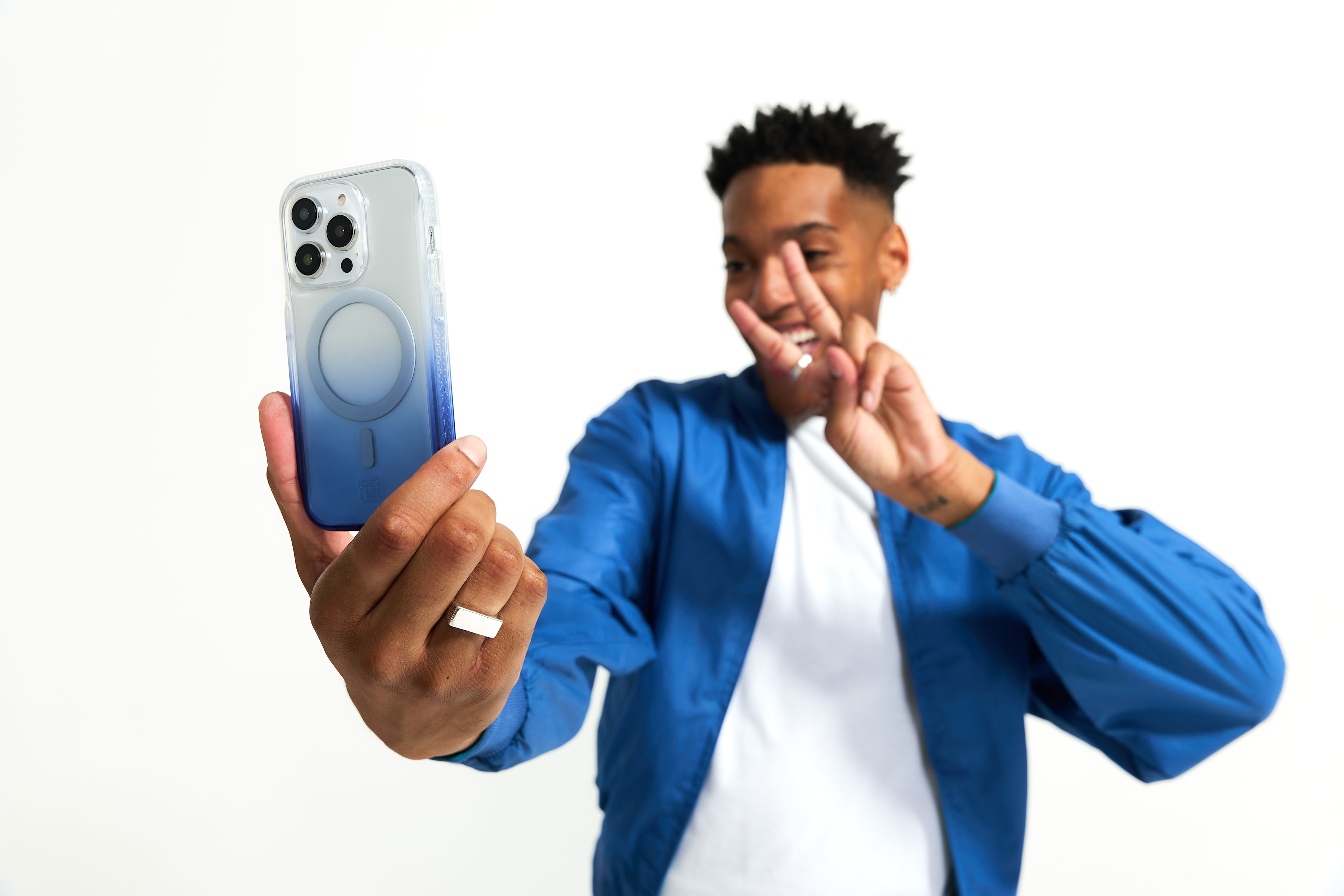 person holding incipio iphone case with MagSafe